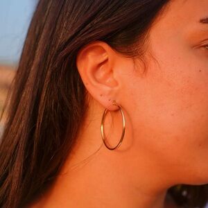Yubama Gold Medium Hoop Earrings.